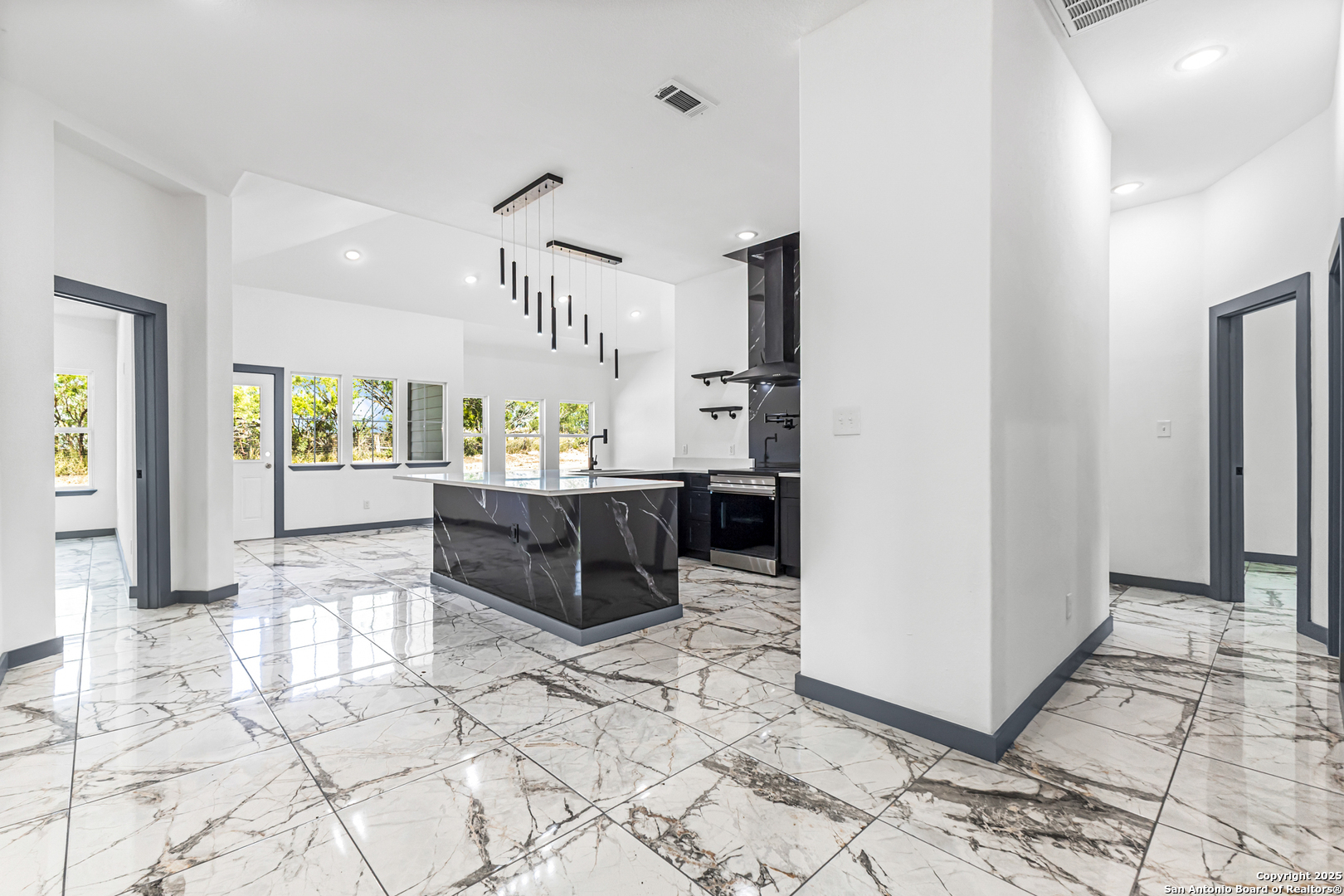 133 Flor Del Sol Road San Antonio, TX 78264 - Photo 5 of 28 a living room with furniture and a table
