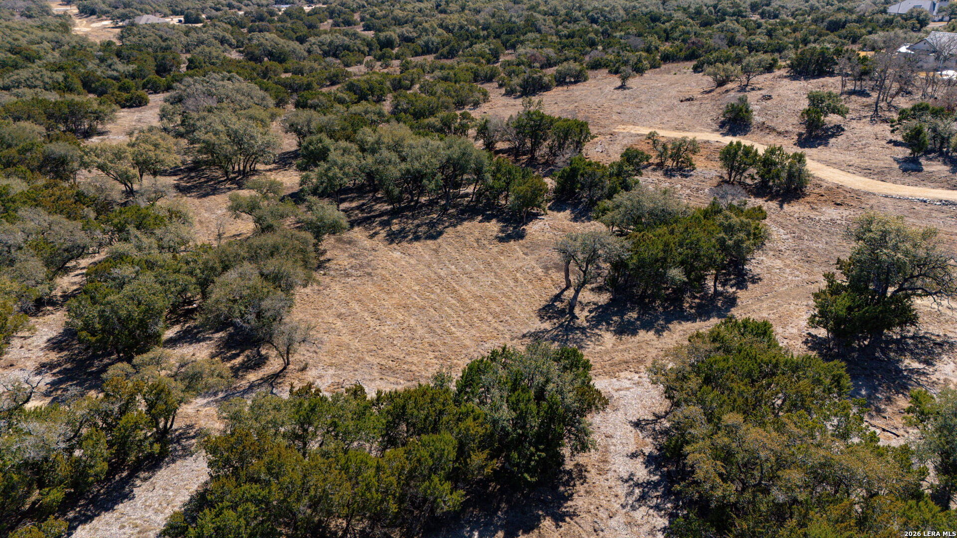 1201 Brewer Rdg Road Bulverde, TX 78163 - Photo 16 of 21 an aerial view of house with yard and green space