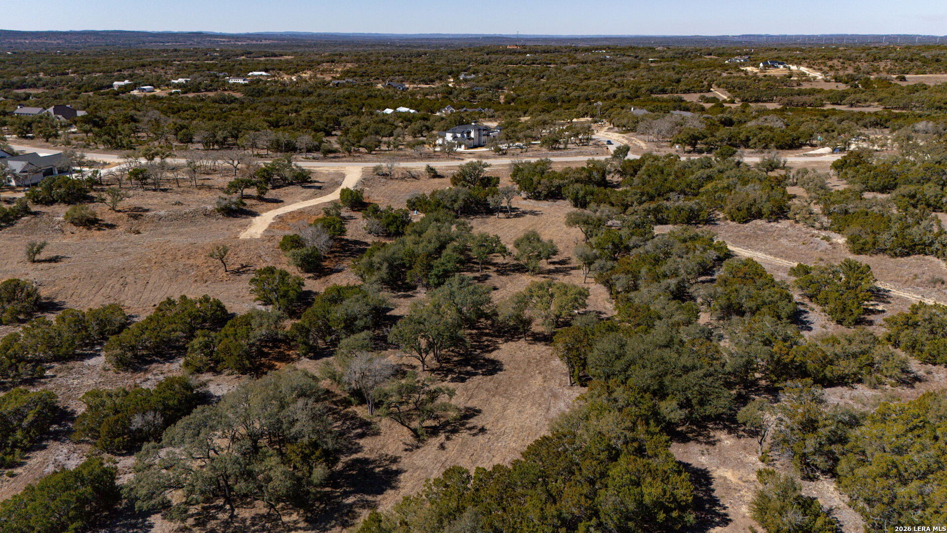 1201 Brewer Rdg Road Bulverde, TX 78163 - Photo 18 of 21 an aerial view of residential houses with outdoor space and trees