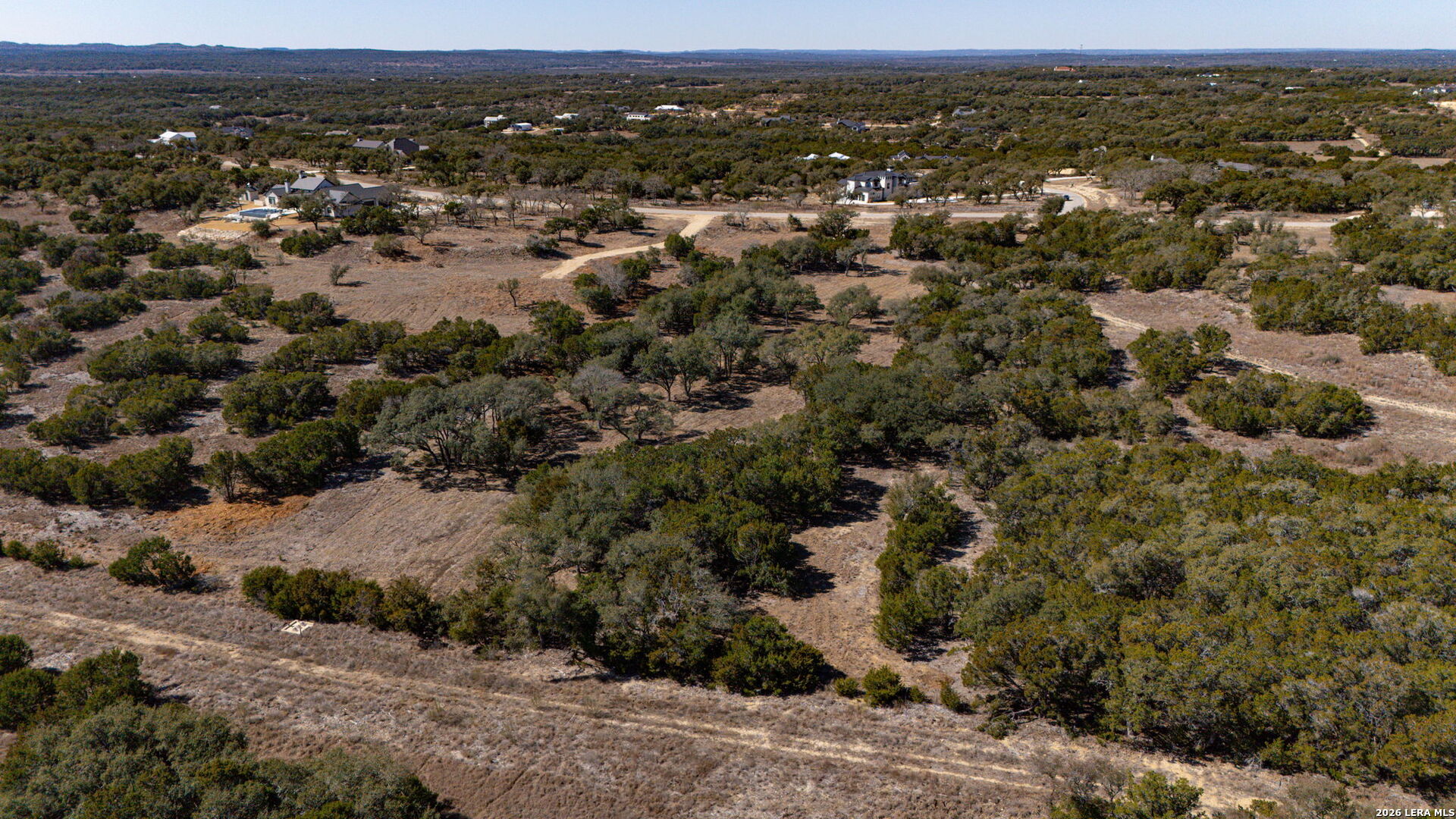 1201 Brewer Rdg Road Bulverde, TX 78163 - Photo 19 of 21 an aerial view of residential houses with outdoor space and trees