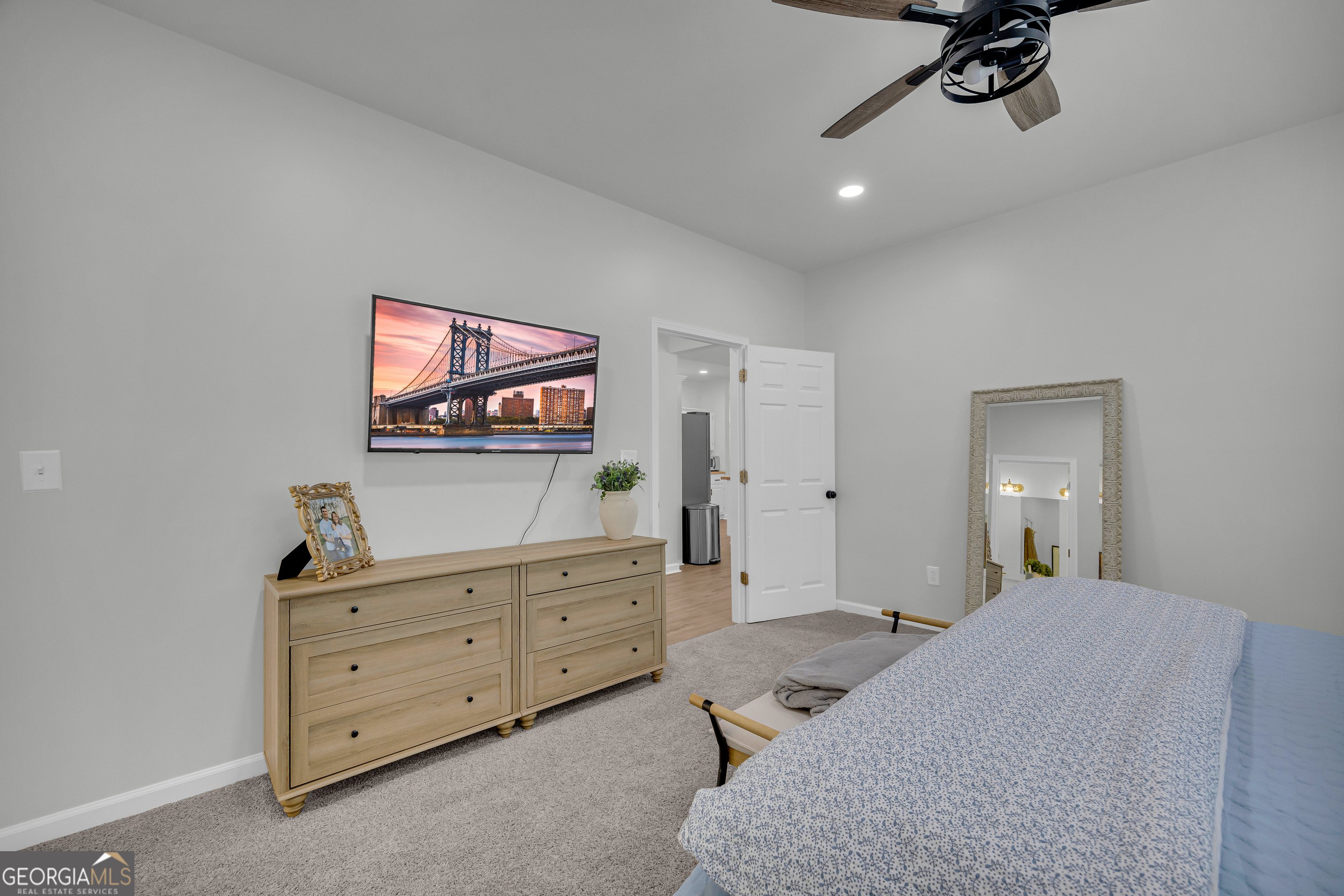 163 Tuxedo Drive Commerce, GA 30530 - Photo 35 of 62 a bedroom with a bed and a dresser