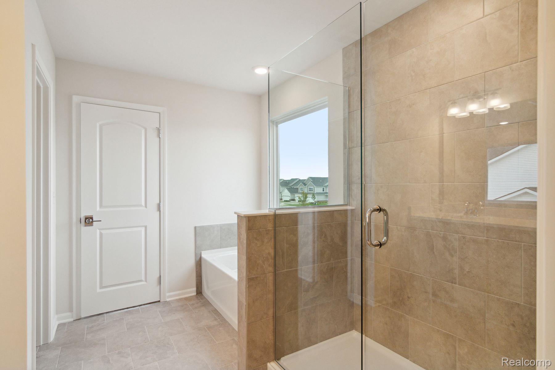 2734 Maize Loop Saline, MI 48176 - Photo 27 of 42 Owner's Bathroom