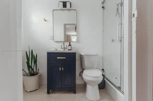 a bathroom with a toilet and a sink
