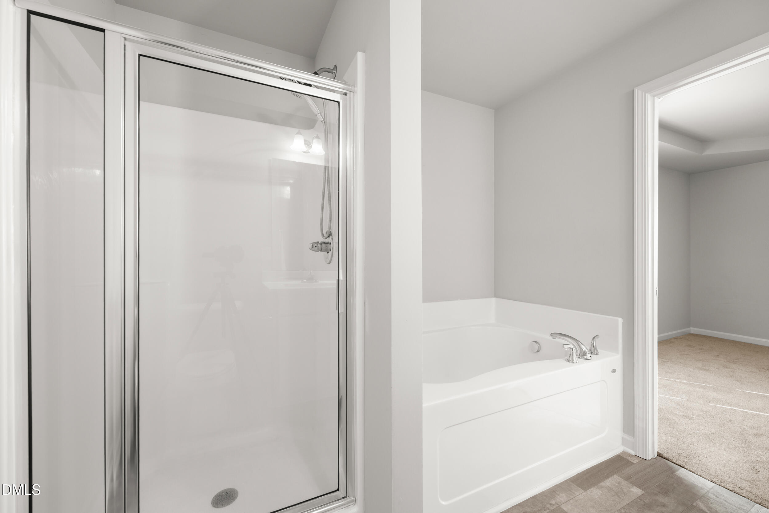 67 Dale Ridge Drive Princeton, NC 27569 - Photo 11 of 22 a bathroom with a bathtub and a shower