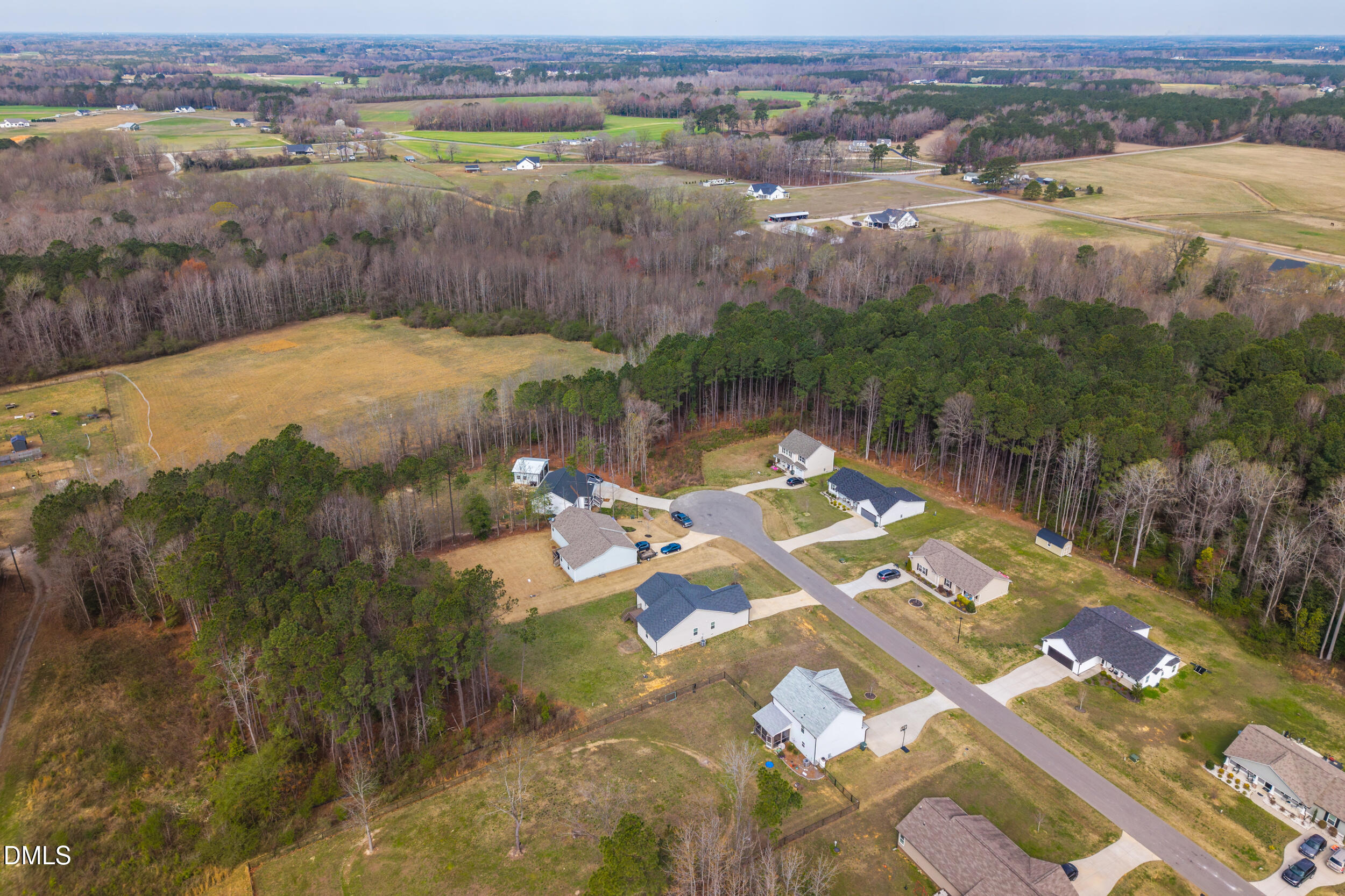 67 Dale Ridge Drive Princeton, NC 27569 - Photo 20 of 22 an aerial view of a house with garden space and lake view