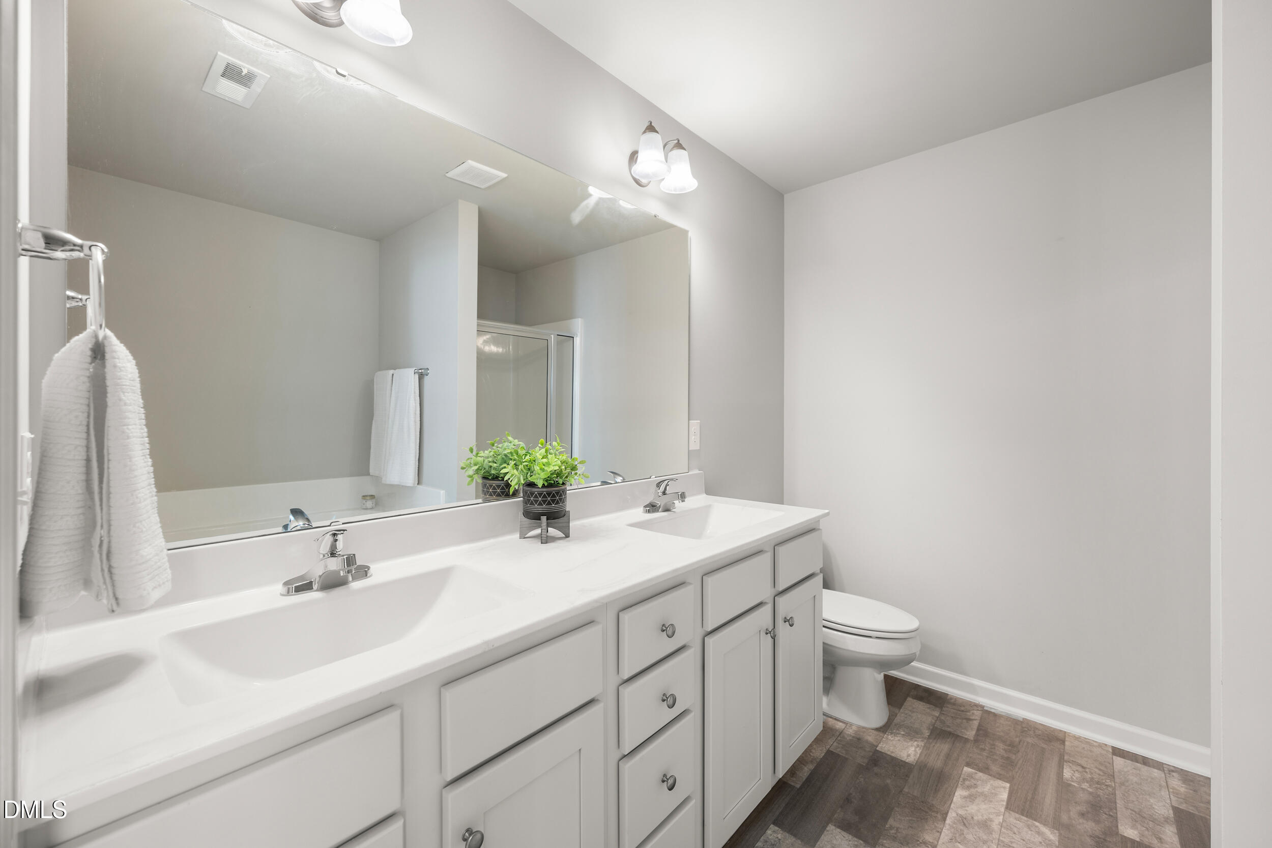 67 Dale Ridge Drive Princeton, NC 27569 - Photo 10 of 22 a bathroom with a sink and a mirror