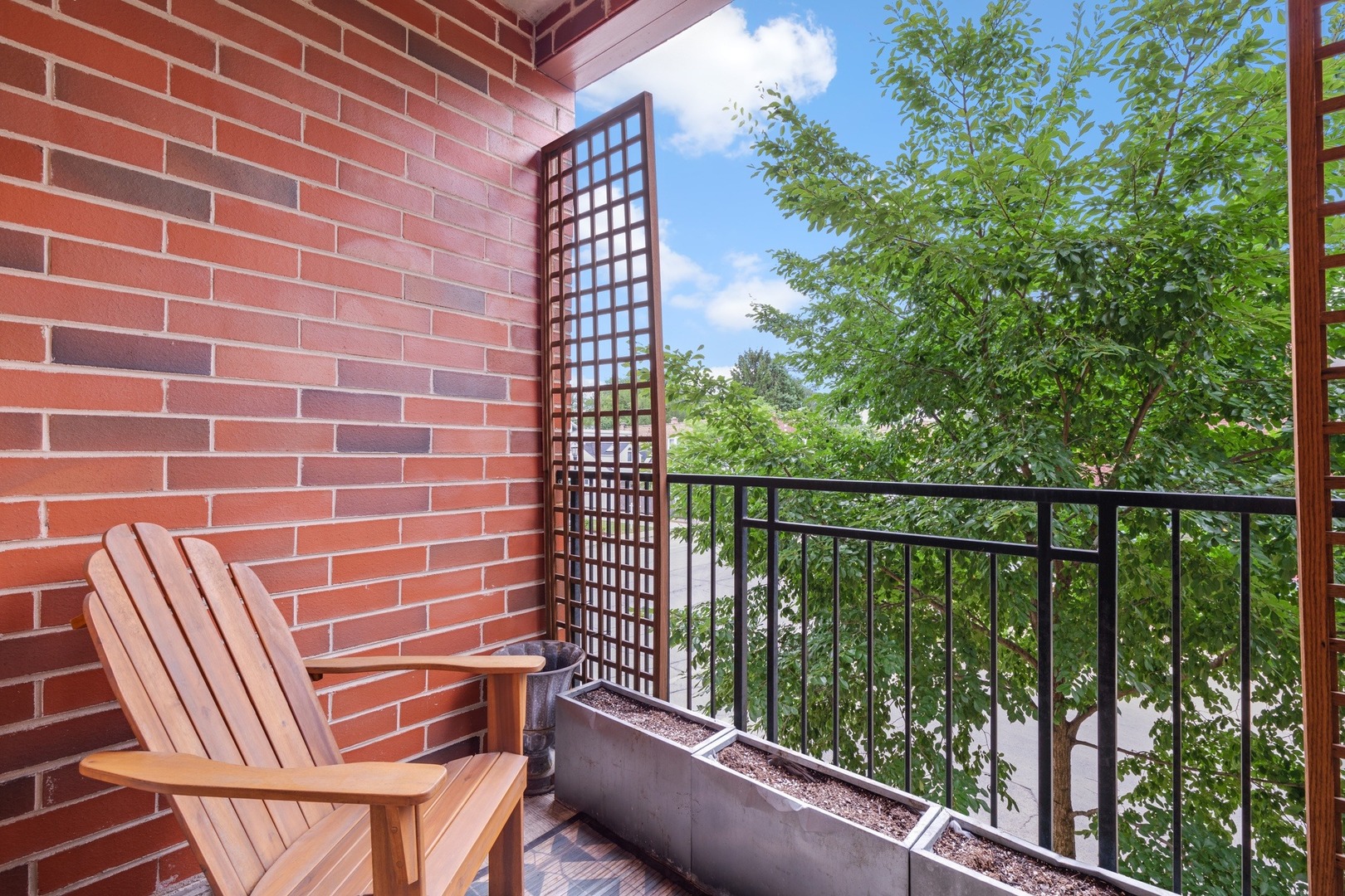 2935 Central Street, Unit 204 Evanston, IL 60201 - Photo 15 of 29 a balcony with a bench
