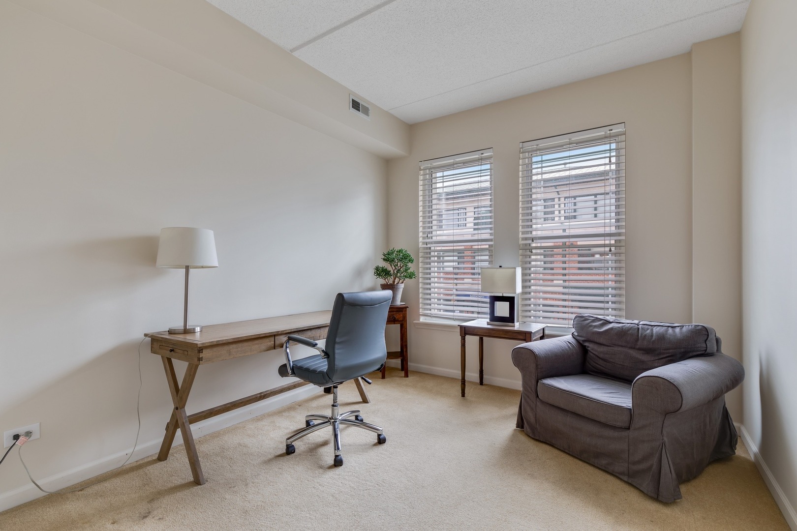2935 Central Street, Unit 204 Evanston, IL 60201 - Photo 23 of 29 a view of a livingroom with workspace and a couch