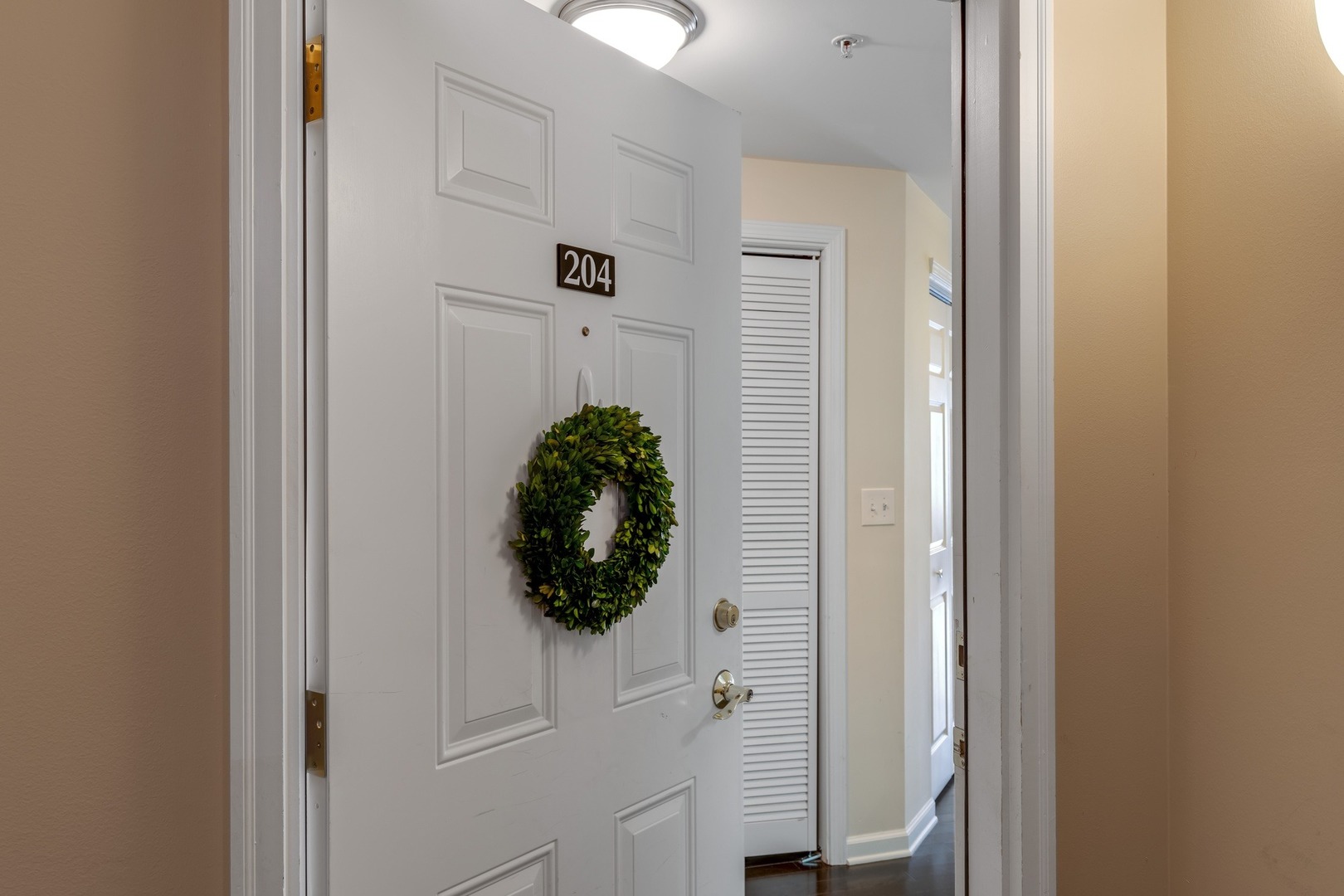 2935 Central Street, Unit 204 Evanston, IL 60201 - Photo 4 of 29 a room with a small entryway and white walls
