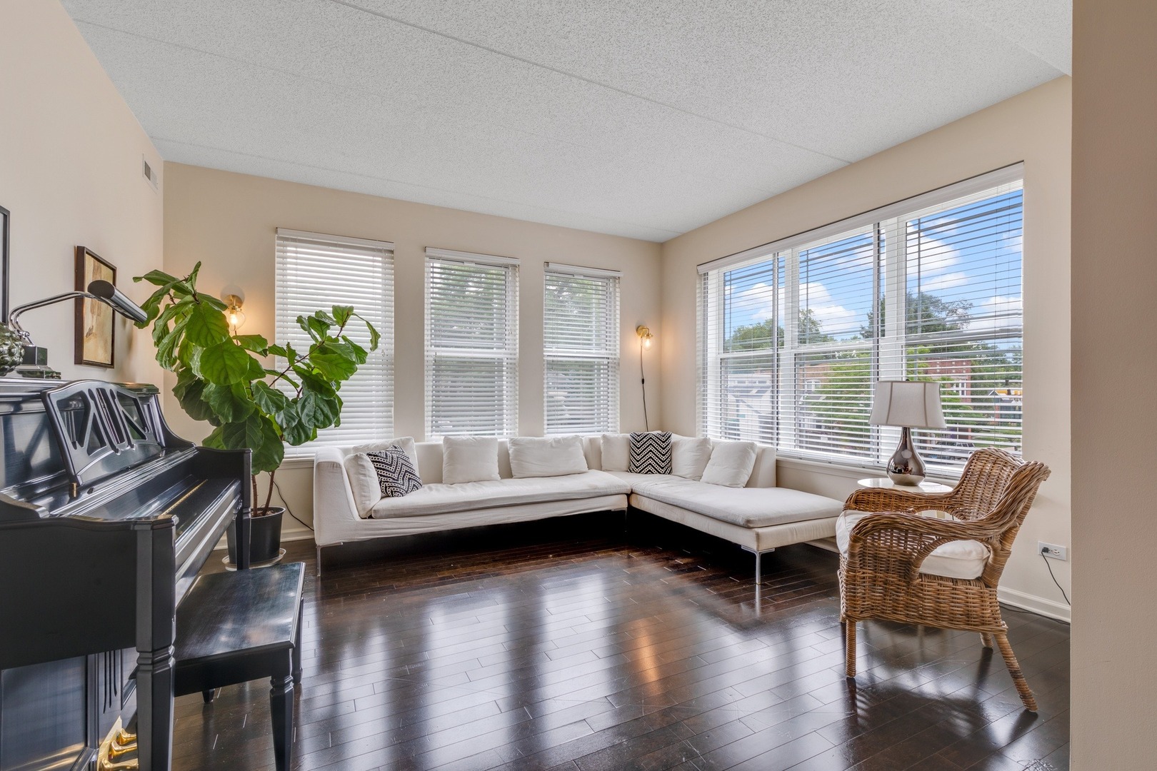2935 Central Street, Unit 204 Evanston, IL 60201 - Photo 6 of 29 a living room with furniture and a large window