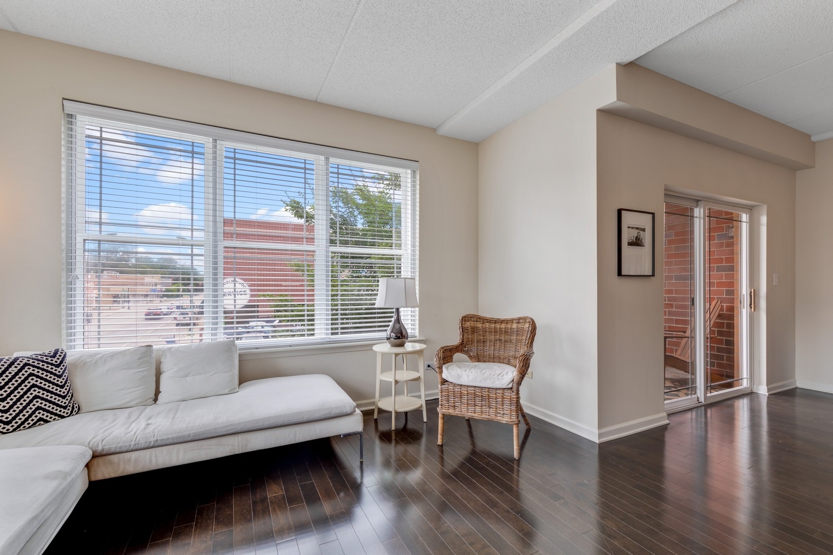 2935 Central Street, Unit 204 Evanston, IL 60201 - Photo 8 of 29 a living room with furniture and a window