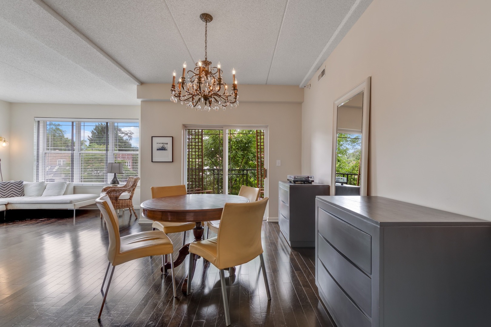 2935 Central Street, Unit 204 Evanston, IL 60201 - Photo 9 of 29 a view of a dining room with furniture window and outside view