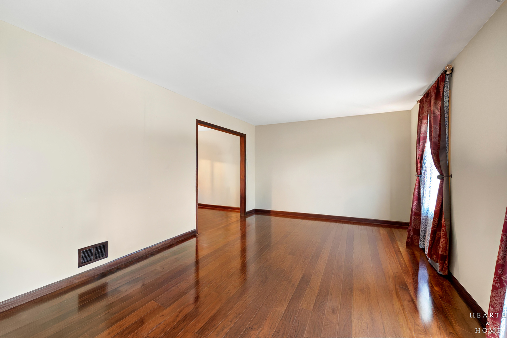 506 Old Hunt Road Fox River Grove, IL 60021 - Photo 4 of 44 an empty room with wooden floor and window