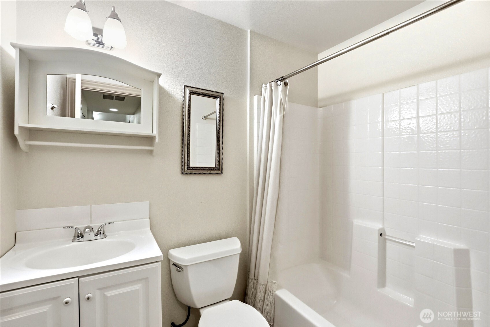 21 East Michelle Court Union, WA 98592 - Photo 13 of 33 a bathroom with a toilet a sink and a bathtub