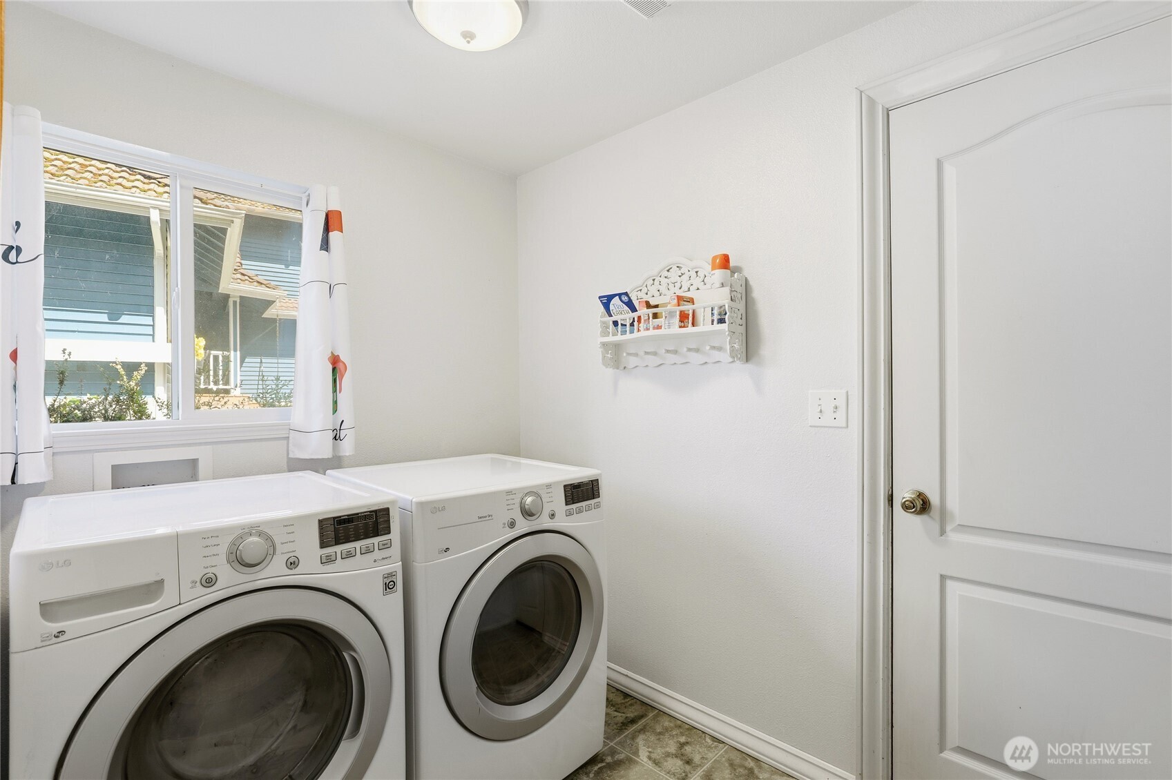 21 East Michelle Court Union, WA 98592 - Photo 14 of 33 a view of washer and dryer in a utility room