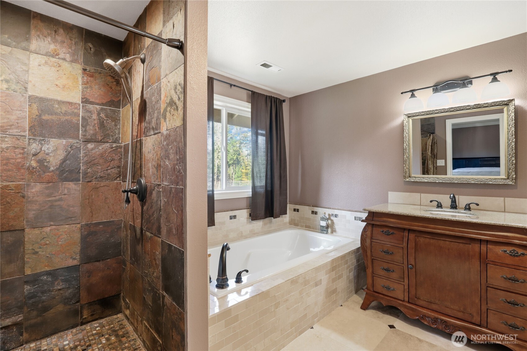 21 East Michelle Court Union, WA 98592 - Photo 18 of 33 a bathroom with a tub sink a mirror and shower