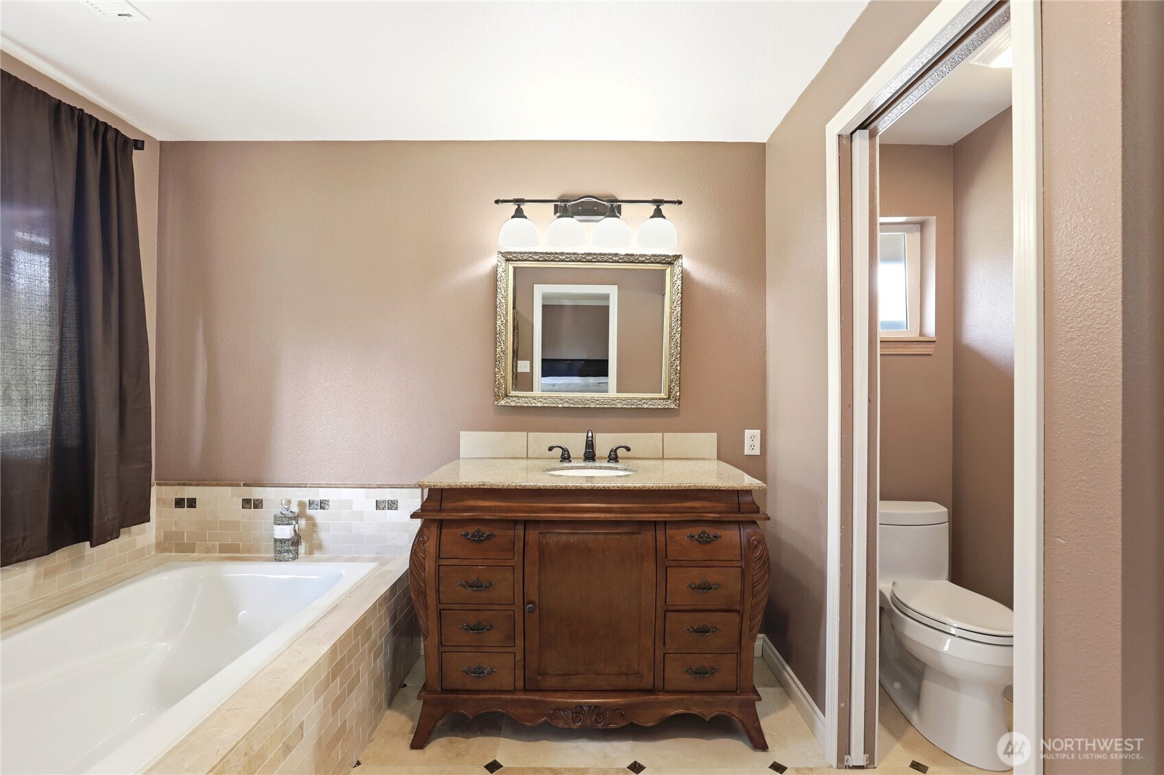 21 East Michelle Court Union, WA 98592 - Photo 19 of 33 a bathroom with a sink and a bathtub