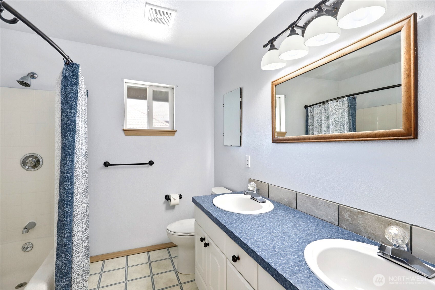 21 East Michelle Court Union, WA 98592 - Photo 20 of 33 a bathroom with a granite countertop sink toilet and shower