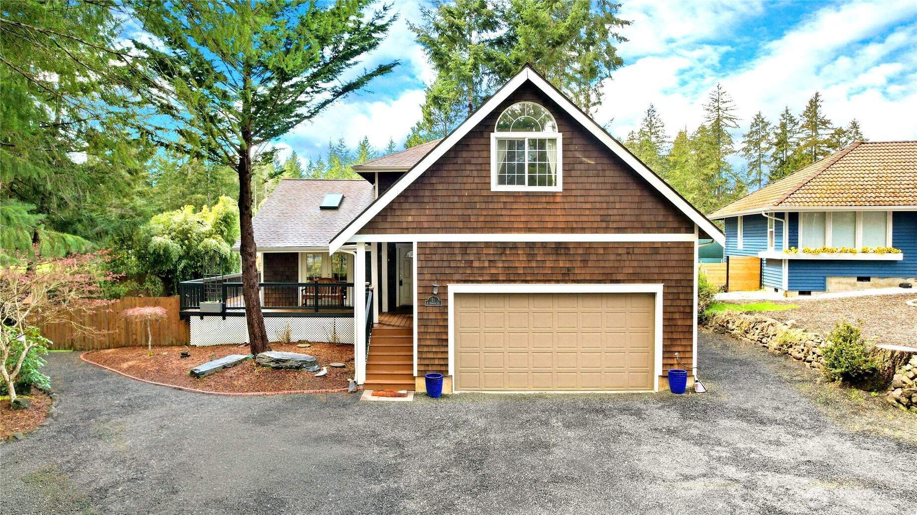 21 East Michelle Court Union, WA 98592 - Photo 2 of 33 a view of a house with a yard and garage