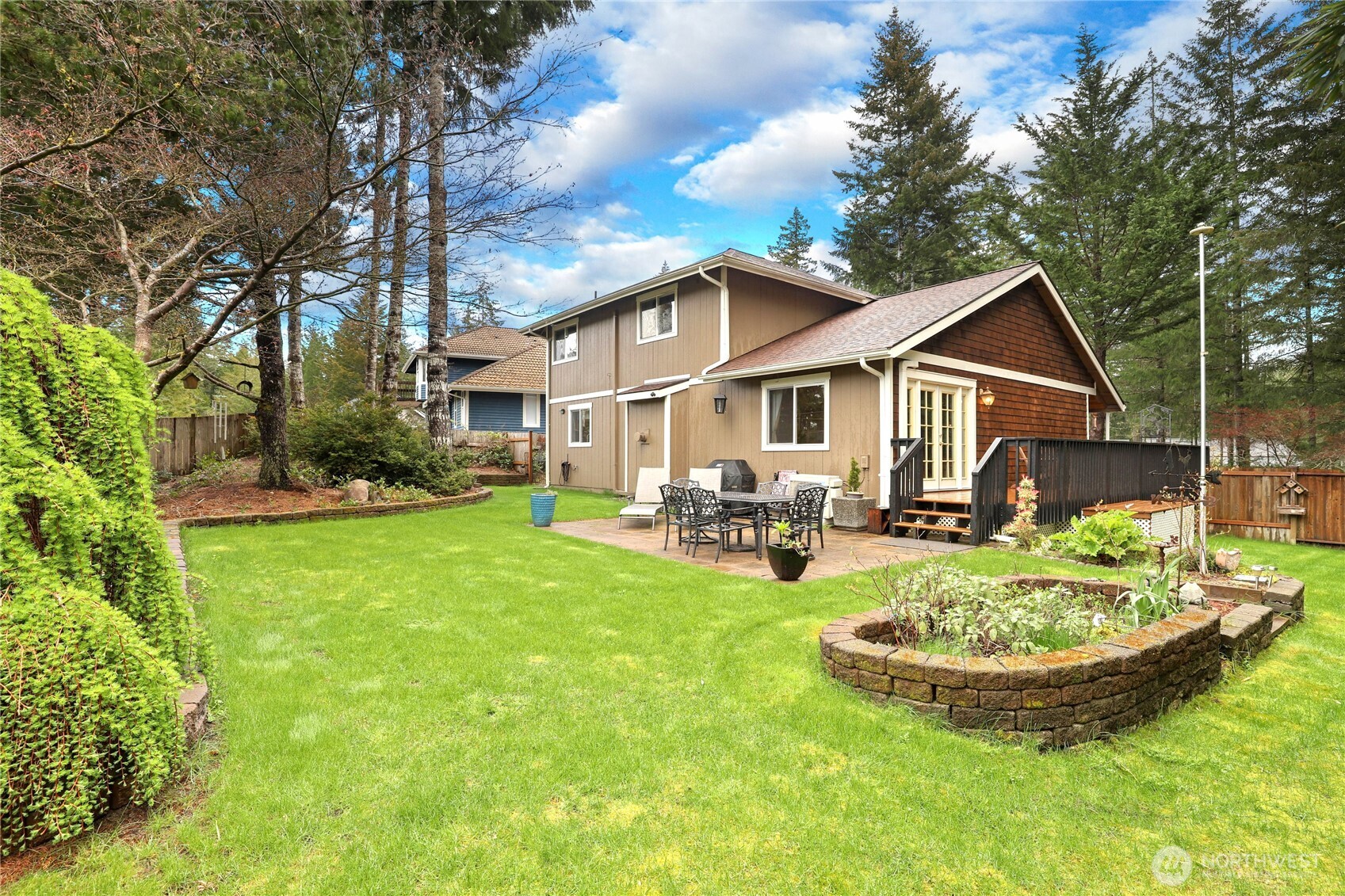 21 East Michelle Court Union, WA 98592 - Photo 26 of 33 a view of a house with backyard porch and sitting area