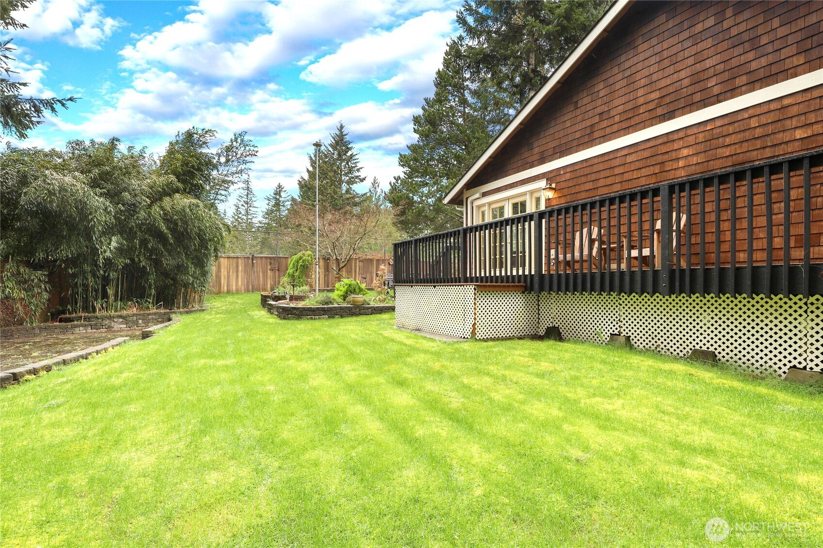 21 East Michelle Court Union, WA 98592 - Photo 27 of 33 a view of a house with backyard and a slide