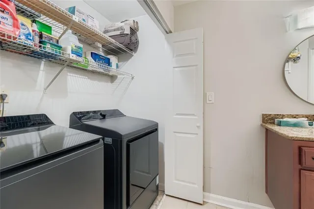 a utility room with dryer and washer