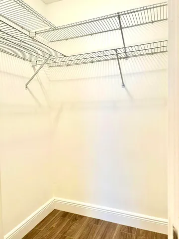 a view of a room with racks on the wall