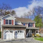 19 Madison Drive Helmetta, NJ 08828 - Photo 1 of 45 a front view of a house with garden