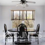 19 Madison Drive Helmetta, NJ 08828 - Photo 17 of 45 a view of a dining room with furniture and a window
