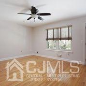 19 Madison Drive Helmetta, NJ 08828 - Photo 20 of 45 a view of an empty room with a window