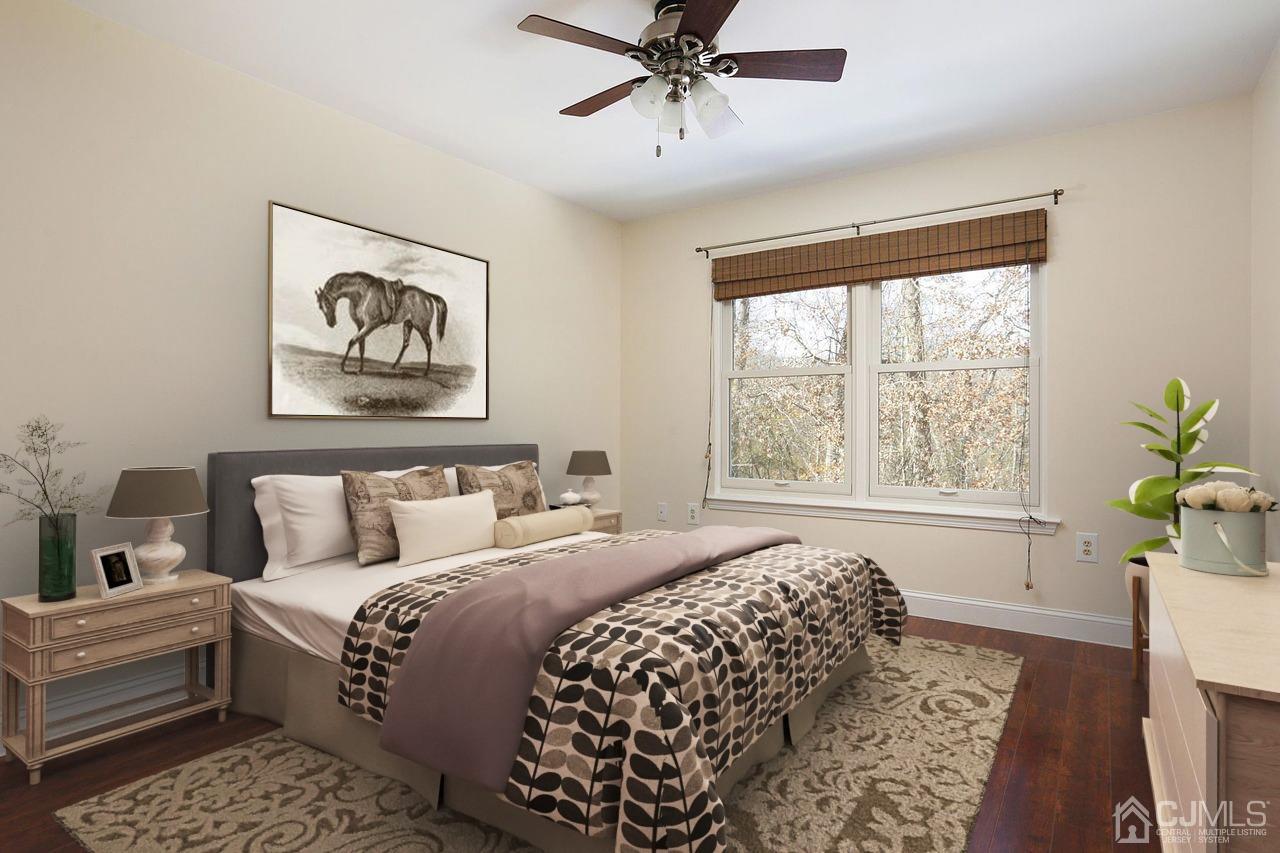 19 Madison Drive Helmetta, NJ 08828 - Photo 21 of 45 a bedroom with a bed and a painting on the wall