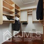 19 Madison Drive Helmetta, NJ 08828 - Photo 31 of 45 a close view of walk in closet