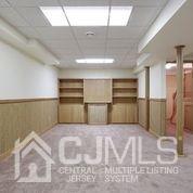 19 Madison Drive Helmetta, NJ 08828 - Photo 38 of 45 a kitchen with stainless steel appliances granite countertop a refrigerator and a sink