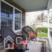 19 Madison Drive Helmetta, NJ 08828 - Photo 5 of 45 a view of a house with a yard