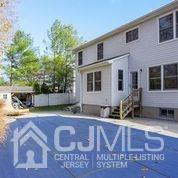 19 Madison Drive Helmetta, NJ 08828 - Photo 45 of 45 a house view with a outdoor space