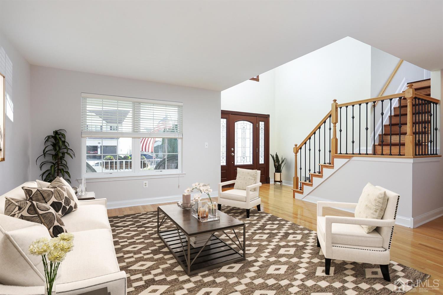 19 Madison Drive Helmetta, NJ 08828 - Photo 7 of 45 a living room with furniture and a window