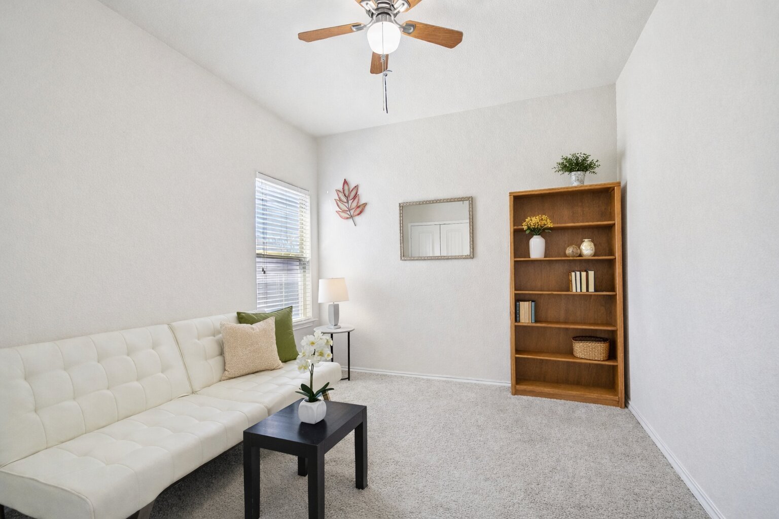10221 Pinnacle Crest Loop Austin, TX 78747 - Photo 11 of 19 a living room with furniture and white walls