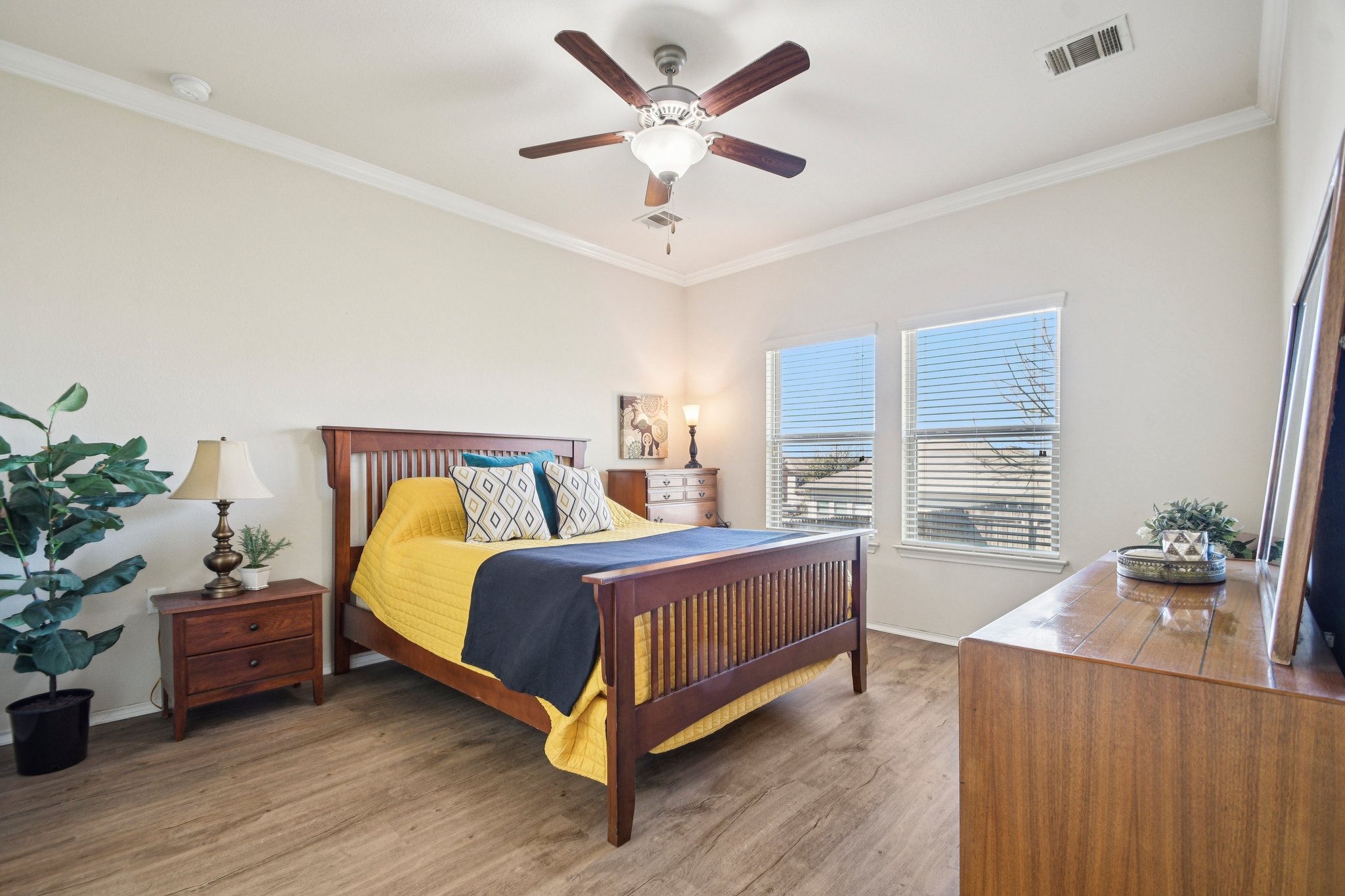 10221 Pinnacle Crest Loop Austin, TX 78747 - Photo 14 of 19 a bed room with a bed and a window