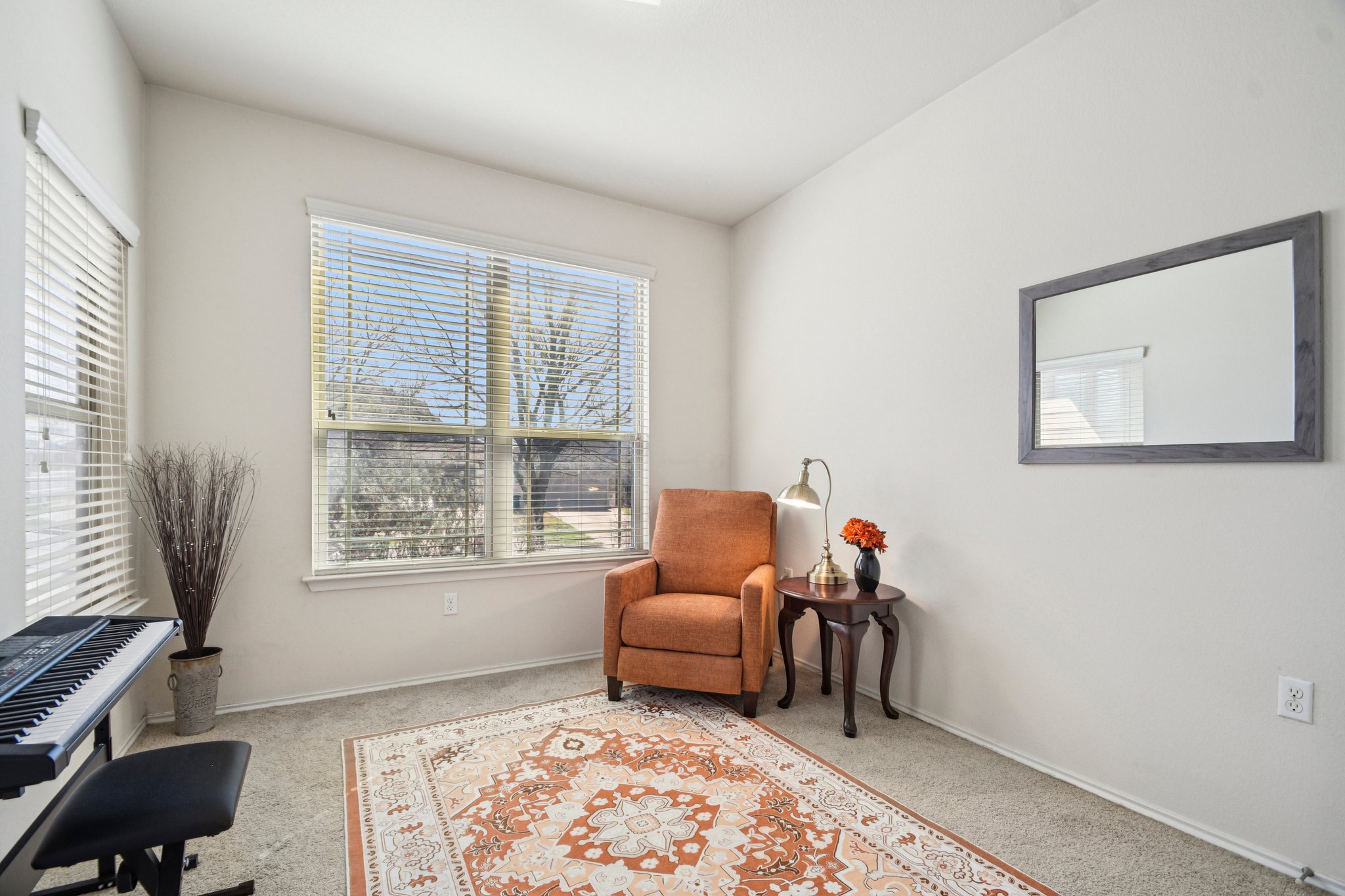 10221 Pinnacle Crest Loop Austin, TX 78747 - Photo 3 of 19 a living room with furniture and a window