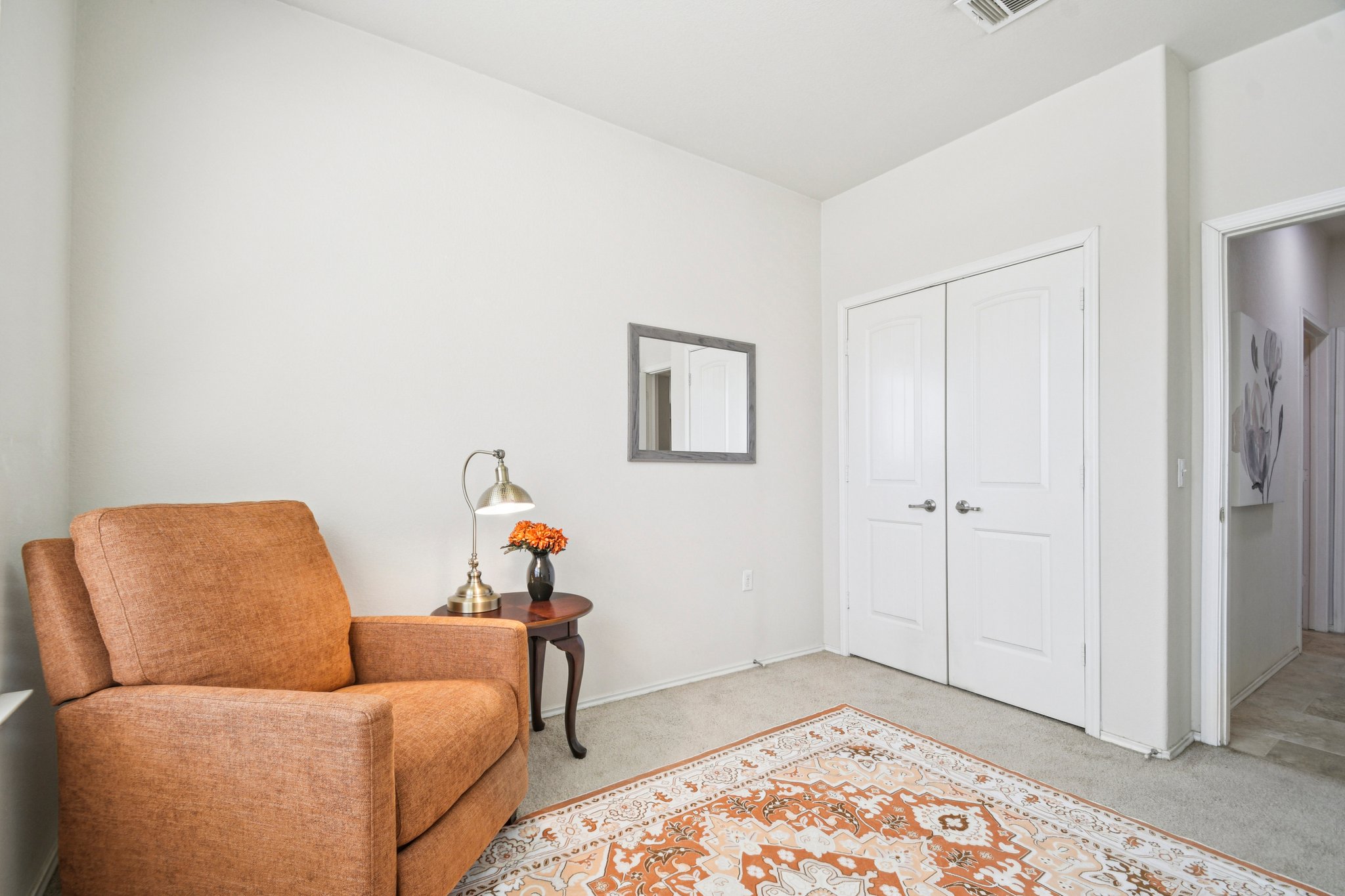 10221 Pinnacle Crest Loop Austin, TX 78747 - Photo 4 of 19 a living room with a couch and a rug