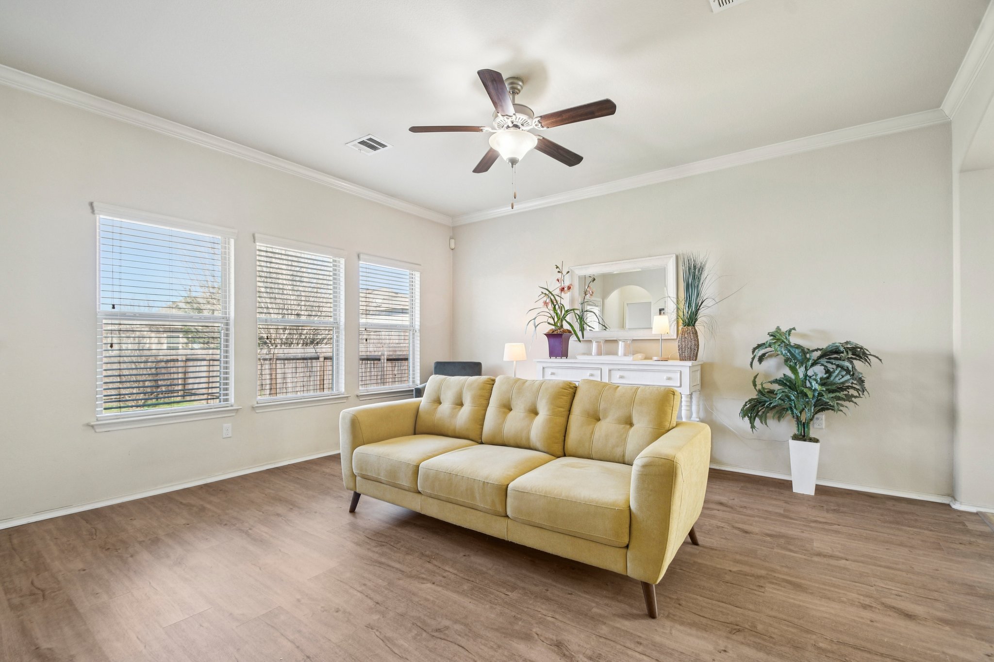 10221 Pinnacle Crest Loop Austin, TX 78747 - Photo 10 of 19 a living room with furniture and a large window