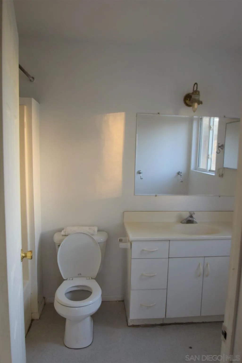 5557 Rainbow Creek Road Fallbrook, CA 92028 - Photo 12 of 24 a bathroom with a toilet sink and mirror