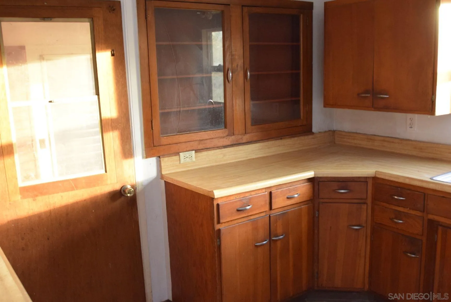 5557 Rainbow Creek Road Fallbrook, CA 92028 - Photo 5 of 24 a view of a kitchen with a sink and cabinets