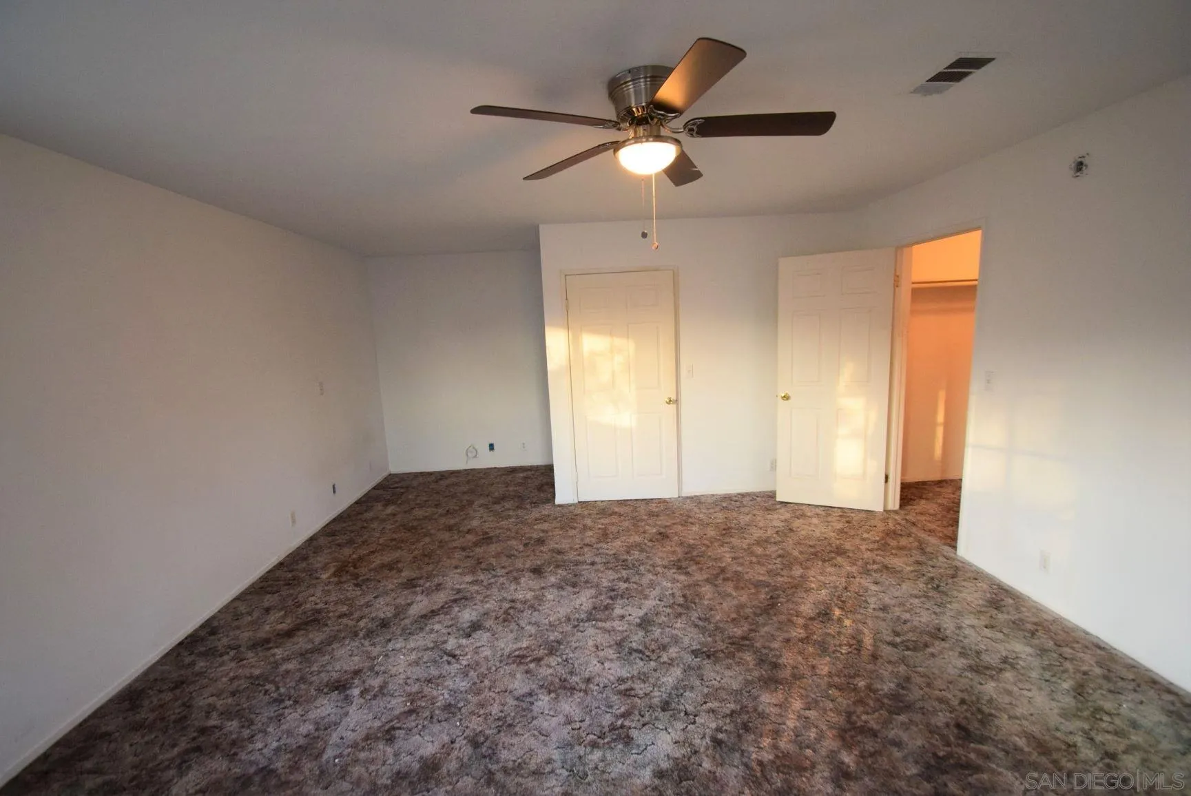 5557 Rainbow Creek Road Fallbrook, CA 92028 - Photo 9 of 24 wooden floor in an empty room