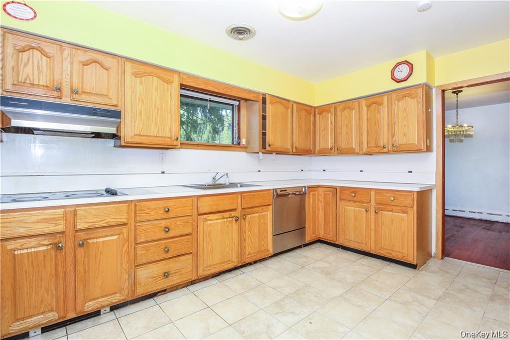 26 Montrose Point Road Montrose, NY 10548 - Photo 2 of 20 a kitchen with granite countertop a sink cabinets and stainless steel appliances