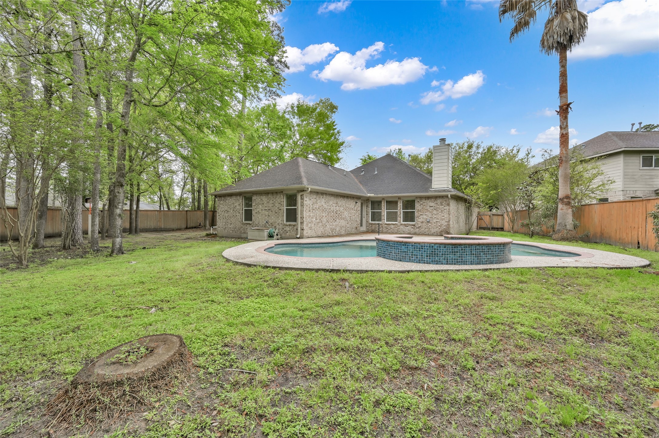 10 Barker Ridge Court Spring, TX 77382 - Photo 28 of 29 a front view of a house with garden