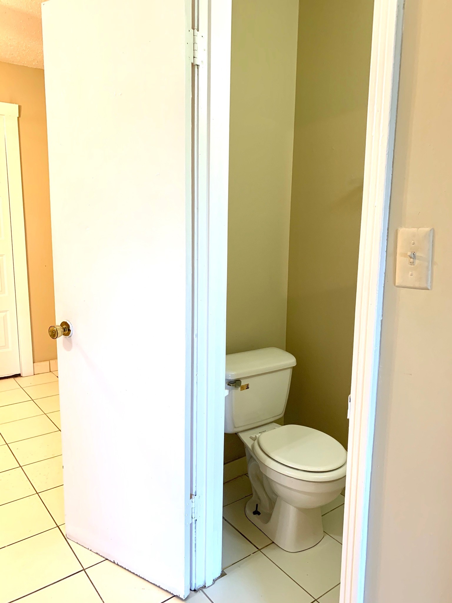 1209 State Line Road, Unit 50 Oak Grove, KY 42262 - Photo 6 of 10 a white toilet sitting next to a sink