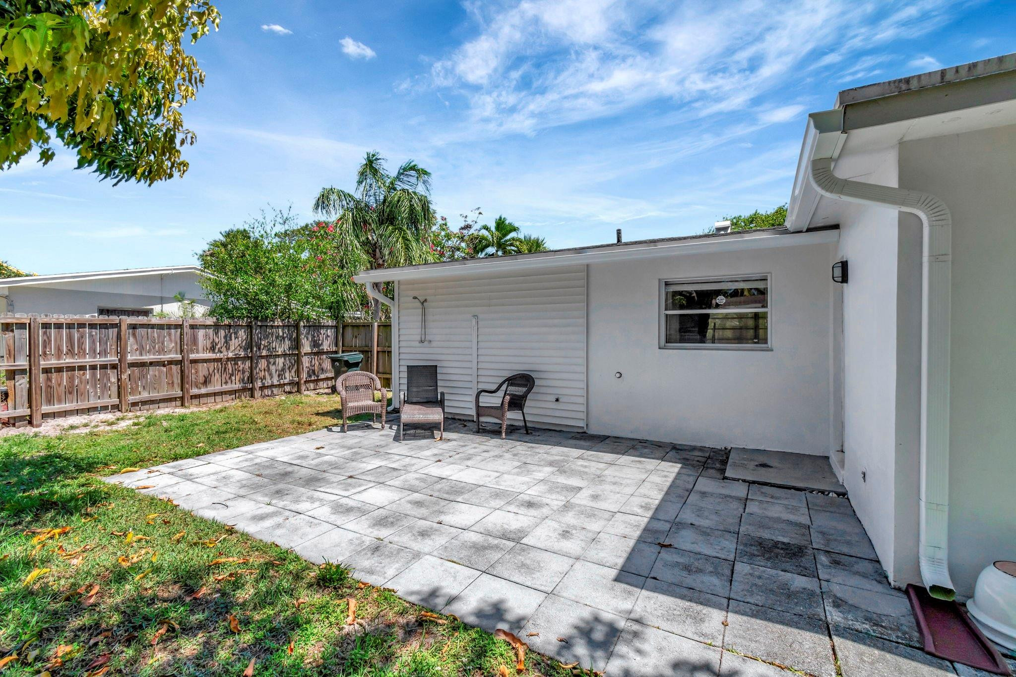 1617 Northwest 4th Street Boca Raton, FL 33486 - Photo 44 of 45 a view of a house with backyard and sitting area