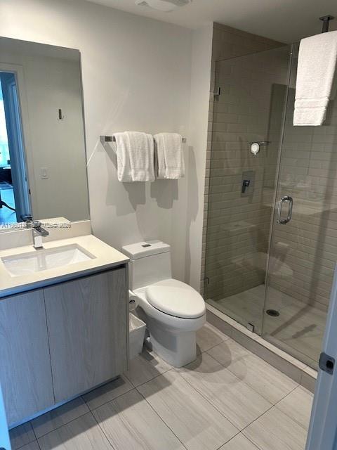 4010 South Ocean Drive, Unit R2702 Hollywood, FL 33019 - Photo 18 of 41 a bathroom with a sink toilet and shower