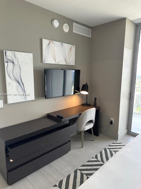 4010 South Ocean Drive, Unit R2702 Hollywood, FL 33019 - Photo 20 of 41 a bedroom with furniture and window